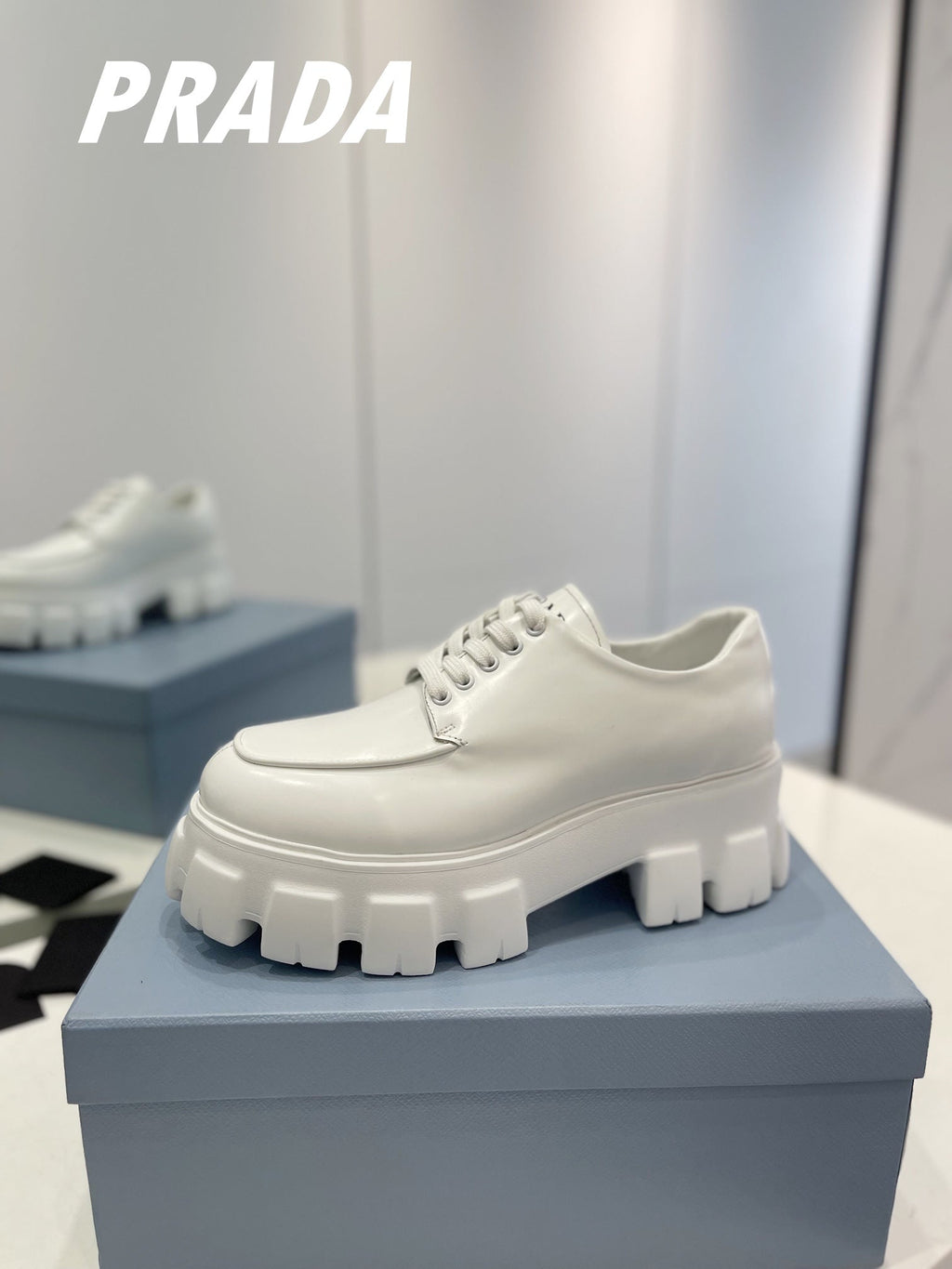 PRADA BRUSHED LEATHER MONOLITH LACE-UP LOAFERS WHITE