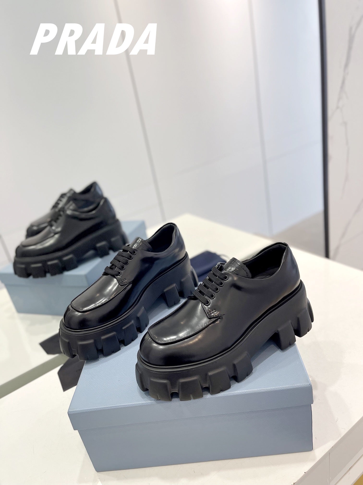 PRADA BRUSHED LEATHER MONOLITH LACE-UP LOAFERS BLACK