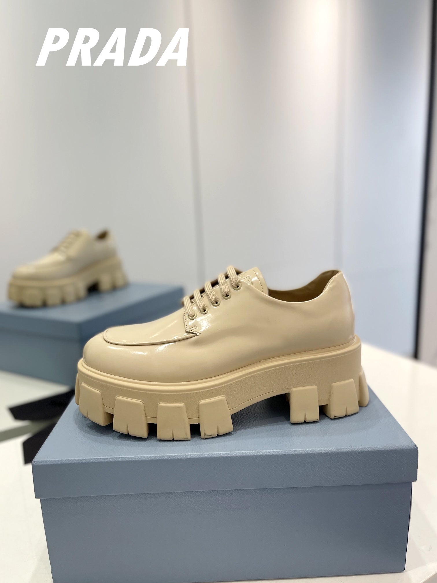 PRADA BRUSHED LEATHER MONOLITH LACE-UP LOAFERS BEIGE