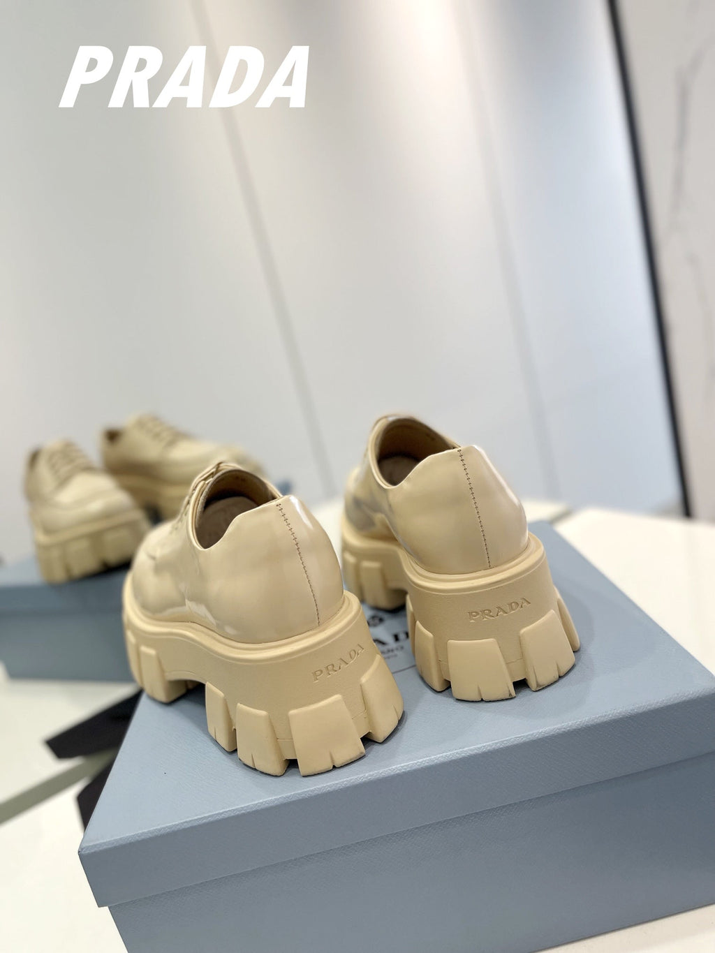 PRADA BRUSHED LEATHER MONOLITH LACE-UP LOAFERS BEIGE