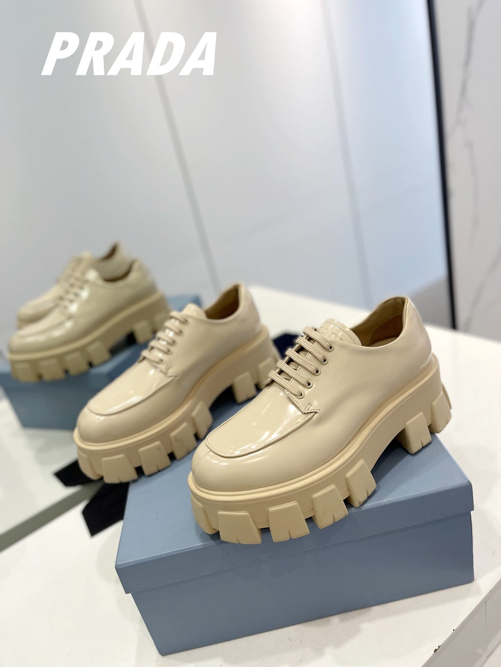 PRADA BRUSHED LEATHER MONOLITH LACE-UP LOAFERS BEIGE