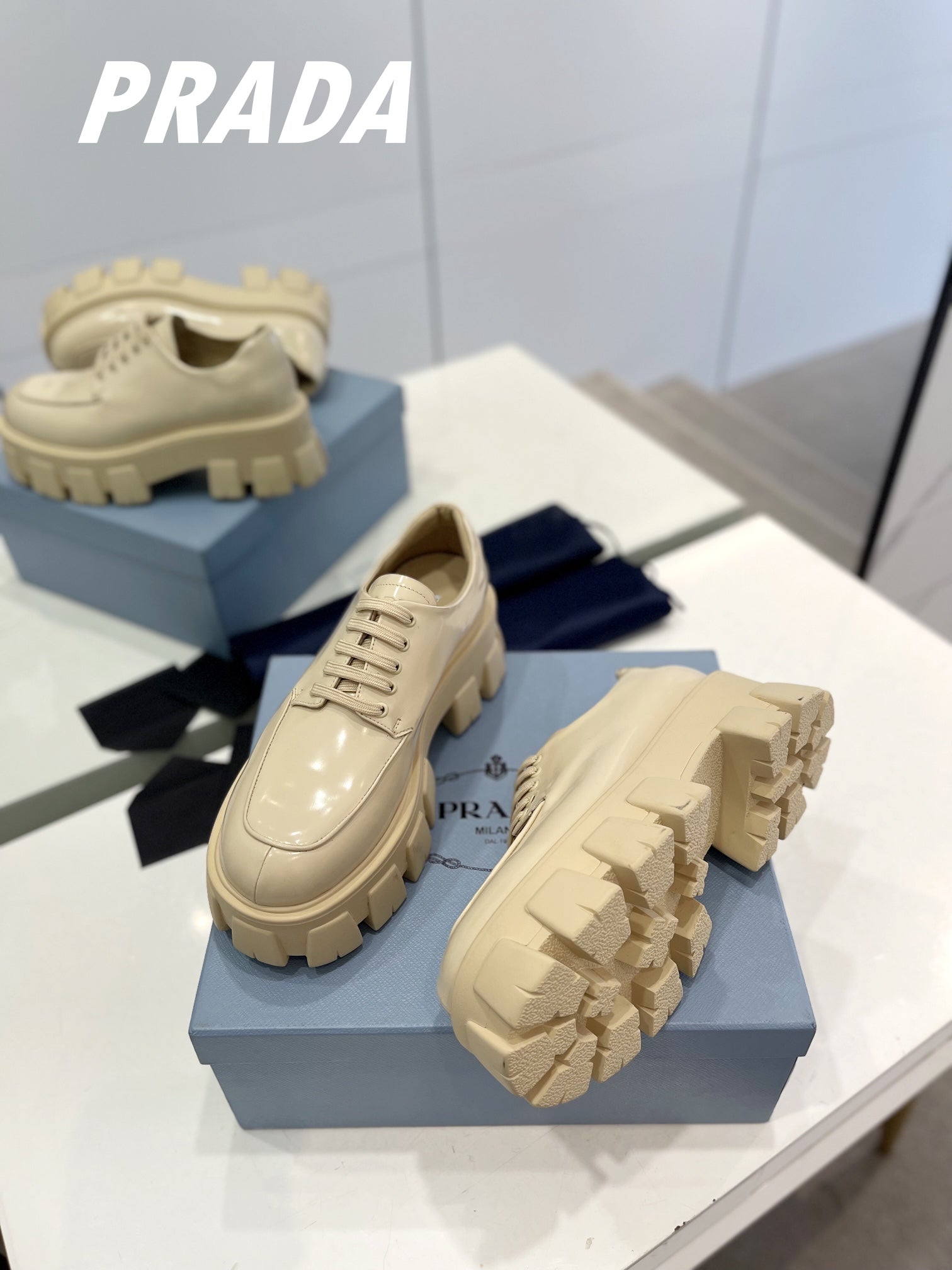PRADA BRUSHED LEATHER MONOLITH LACE-UP LOAFERS BEIGE