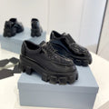 PRADA MONOLITH LACE-UP LOAFER IN BLACK GLOSSY CALFSKIN ATTACHED TRIANGLE LOGO