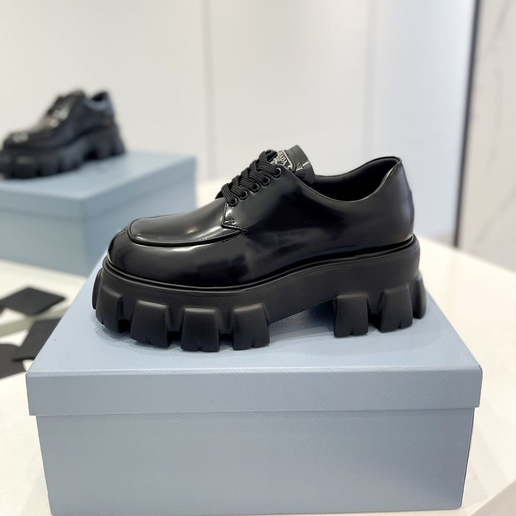 PRADA MONOLITH LACE-UP LOAFER IN BLACK CALFSKIN ATTACHED TRIANGLE LOGO