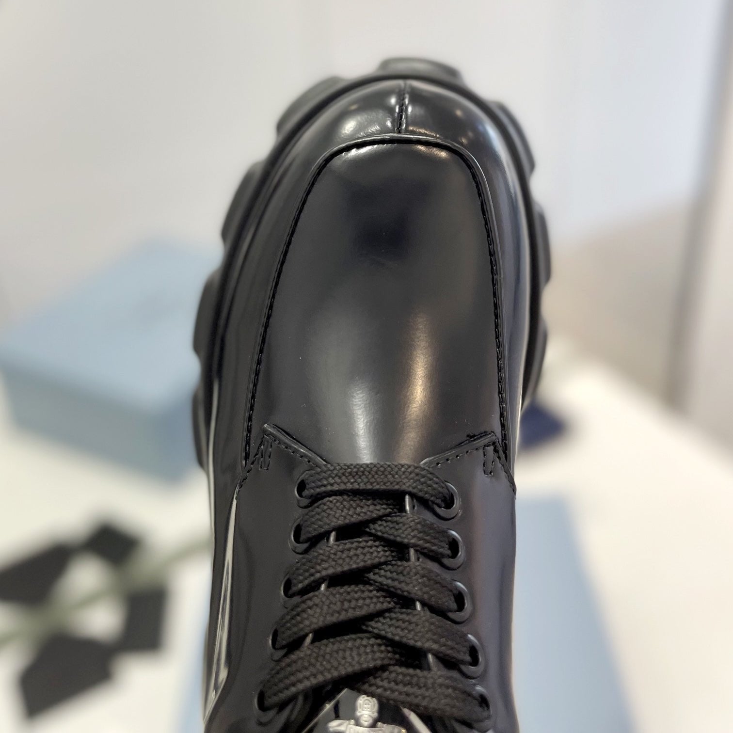 PRADA MONOLITH LACE-UP LOAFER IN BLACK CALFSKIN ATTACHED TRIANGLE LOGO