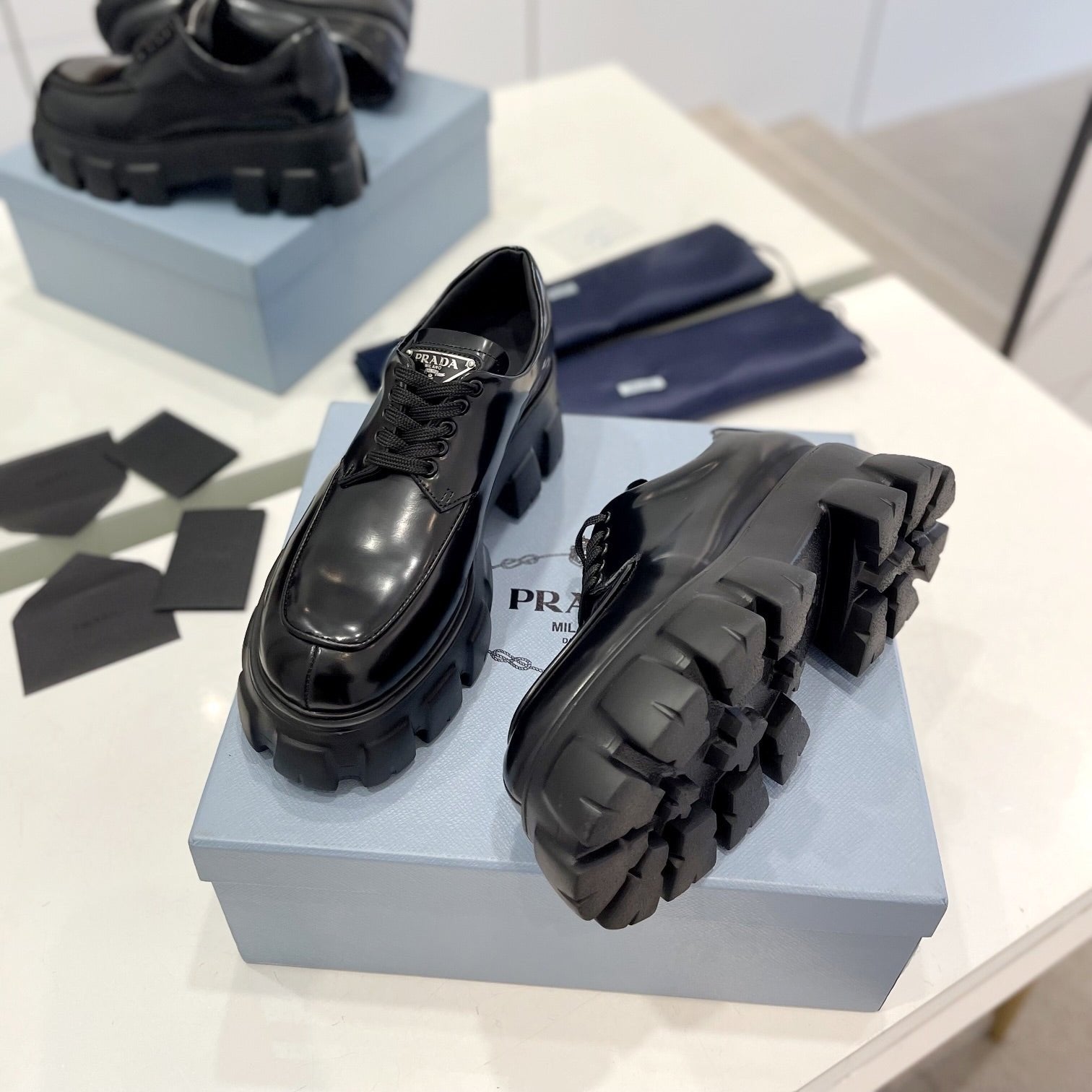 PRADA MONOLITH LACE-UP LOAFER IN BLACK CALFSKIN ATTACHED TRIANGLE LOGO