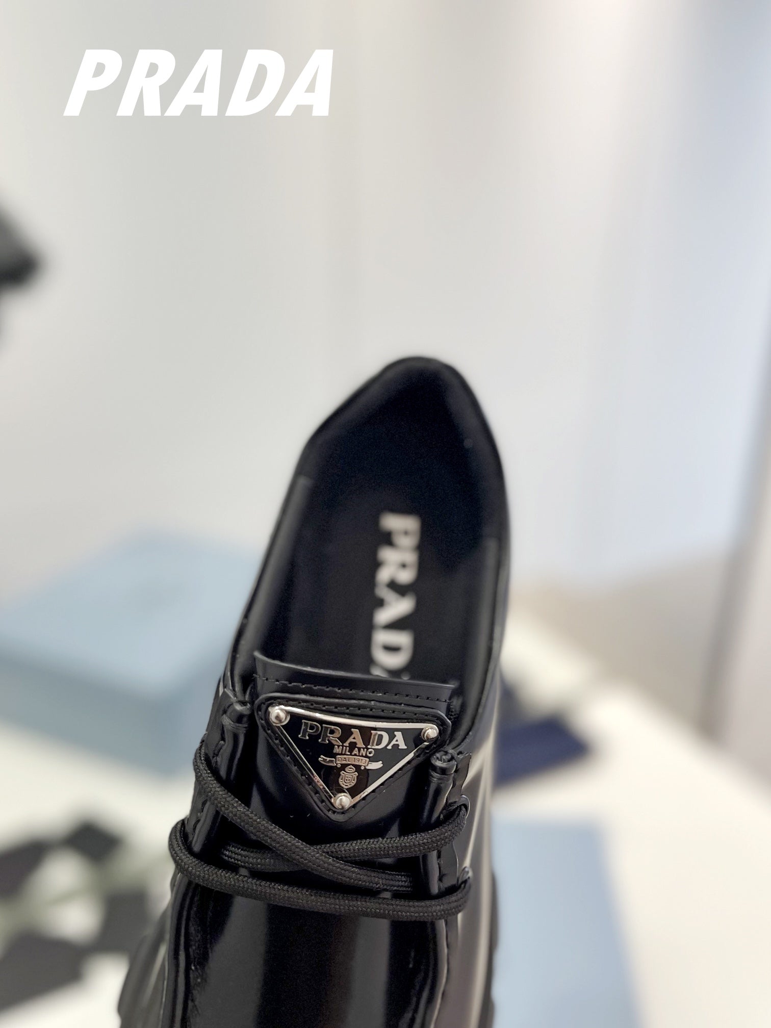 PRADA MONOLITH LACE-UP LOAFERS BLACK CALFSKIN