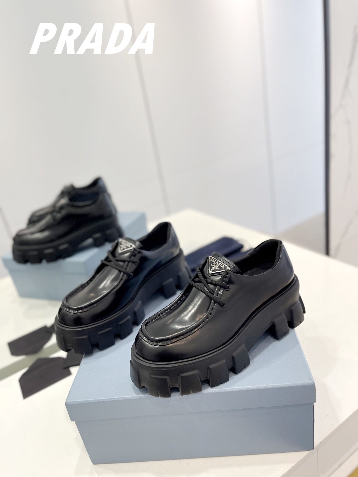 PRADA MONOLITH LACE-UP LOAFERS BLACK CALFSKIN