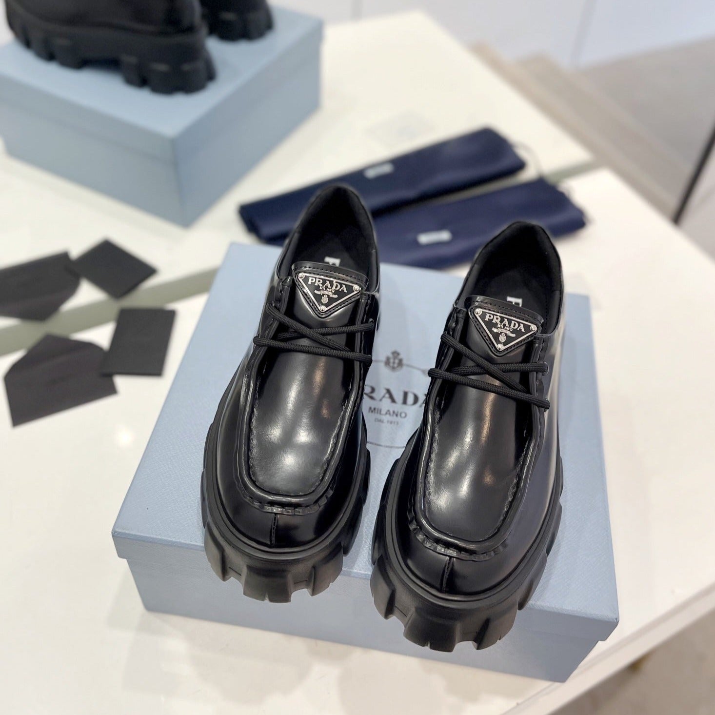 PRADA MONOLITH LACE-UP LOAFERS BLACK CALFSKIN