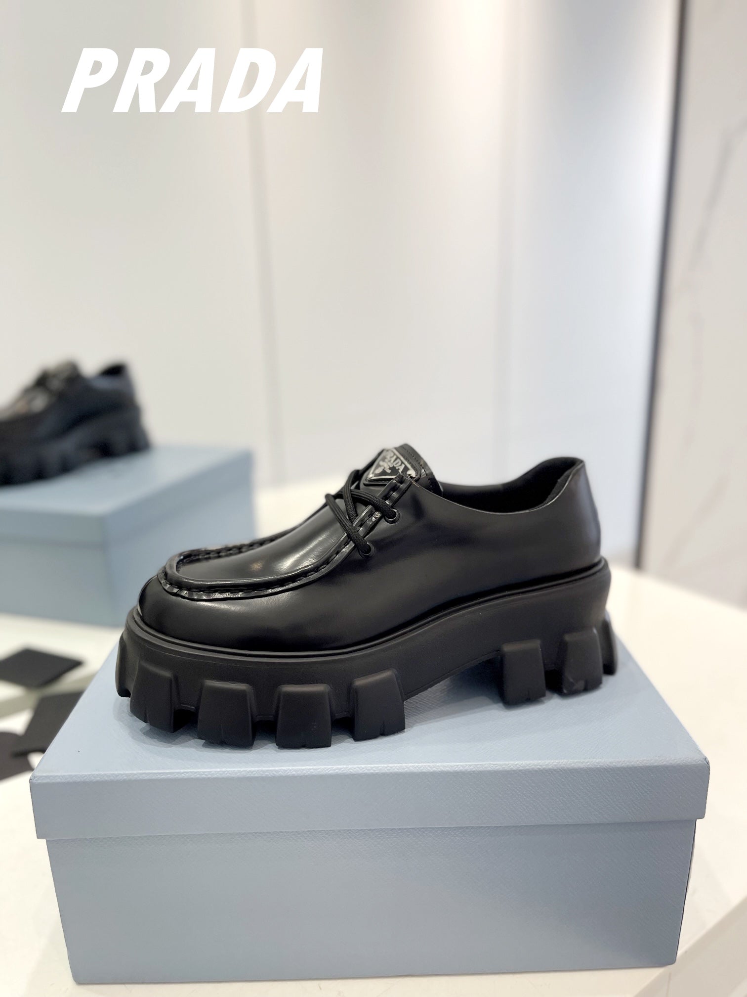 PRADA MONOLITH LACE-UP LOAFERS BLACK CALFSKIN