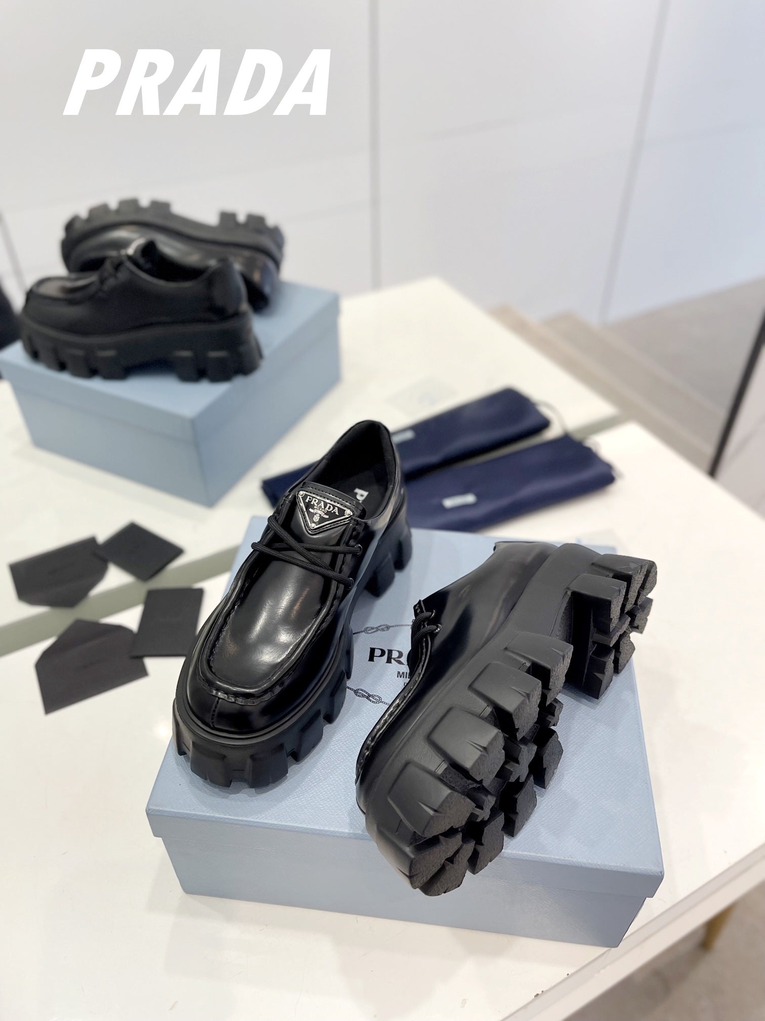 PRADA MONOLITH LACE-UP LOAFERS BLACK CALFSKIN