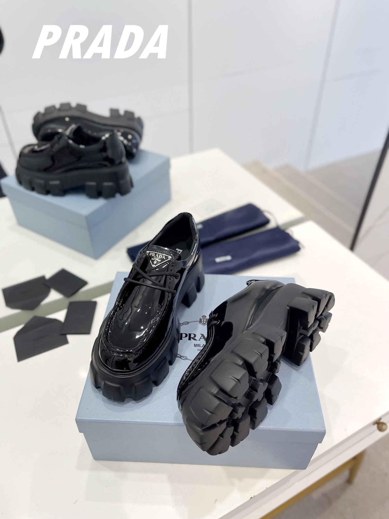 PRADA MONOLITH LACE-UP LOAFERS GLOSSY BLACK CALFSKIN