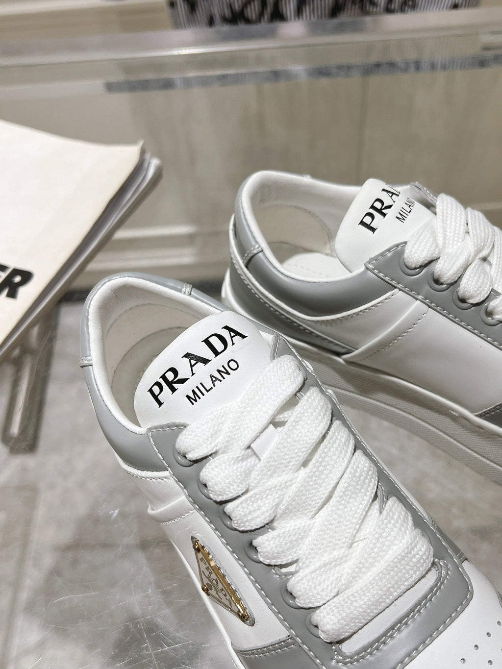 PRADA DOWNTOWN BOLD SNEAKERS WHITE AND LIGHT GRAY CALFSKIN