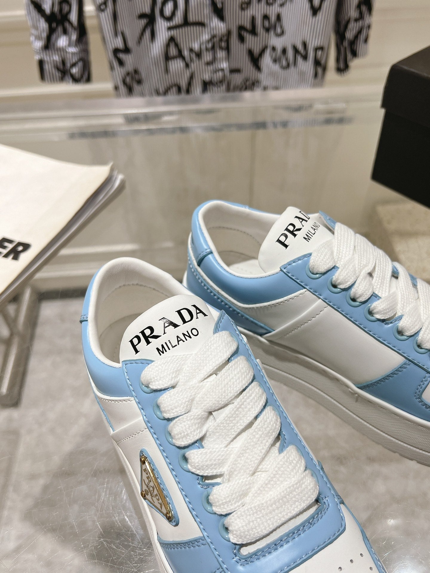 PRADA DOWNTOWN BOLD SNEAKERS WHITE AND SKY CALFSKIN