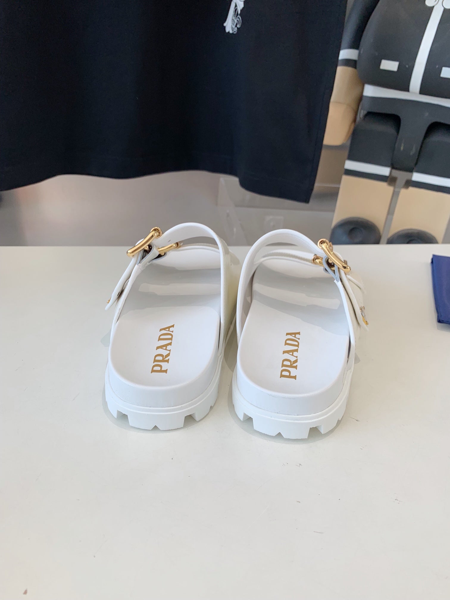 PRADA STRAP SLIDES SANLS GLOSSY WHITE CALFSKIN