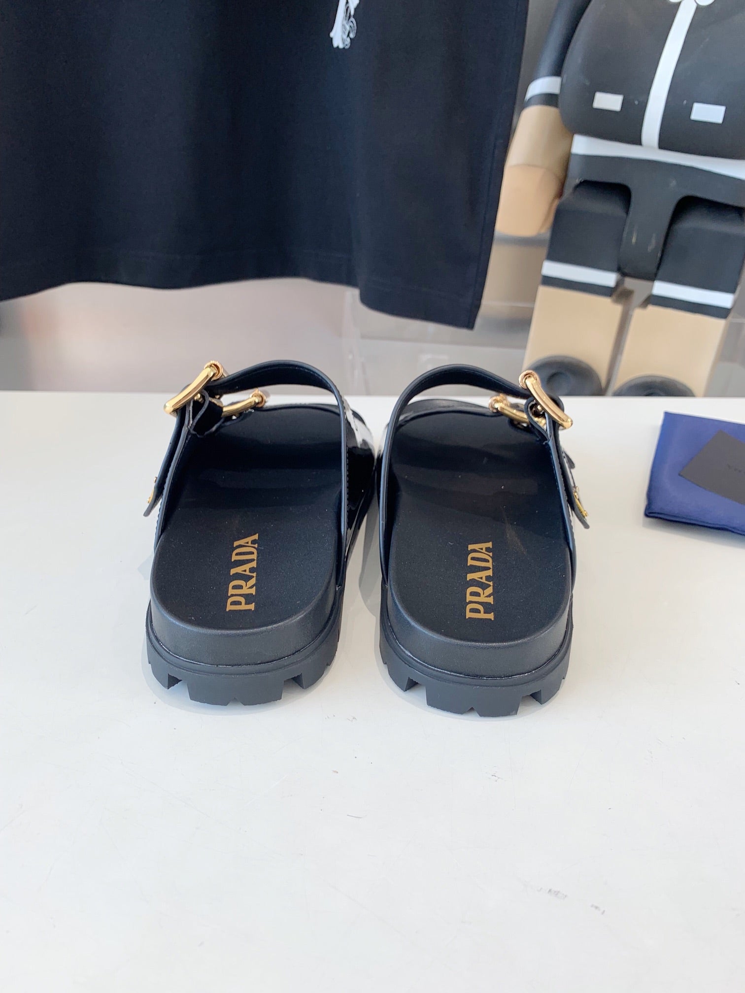 PRADA STRAP SLIDES SANLS GLOSSY BLACK CALFSKIN