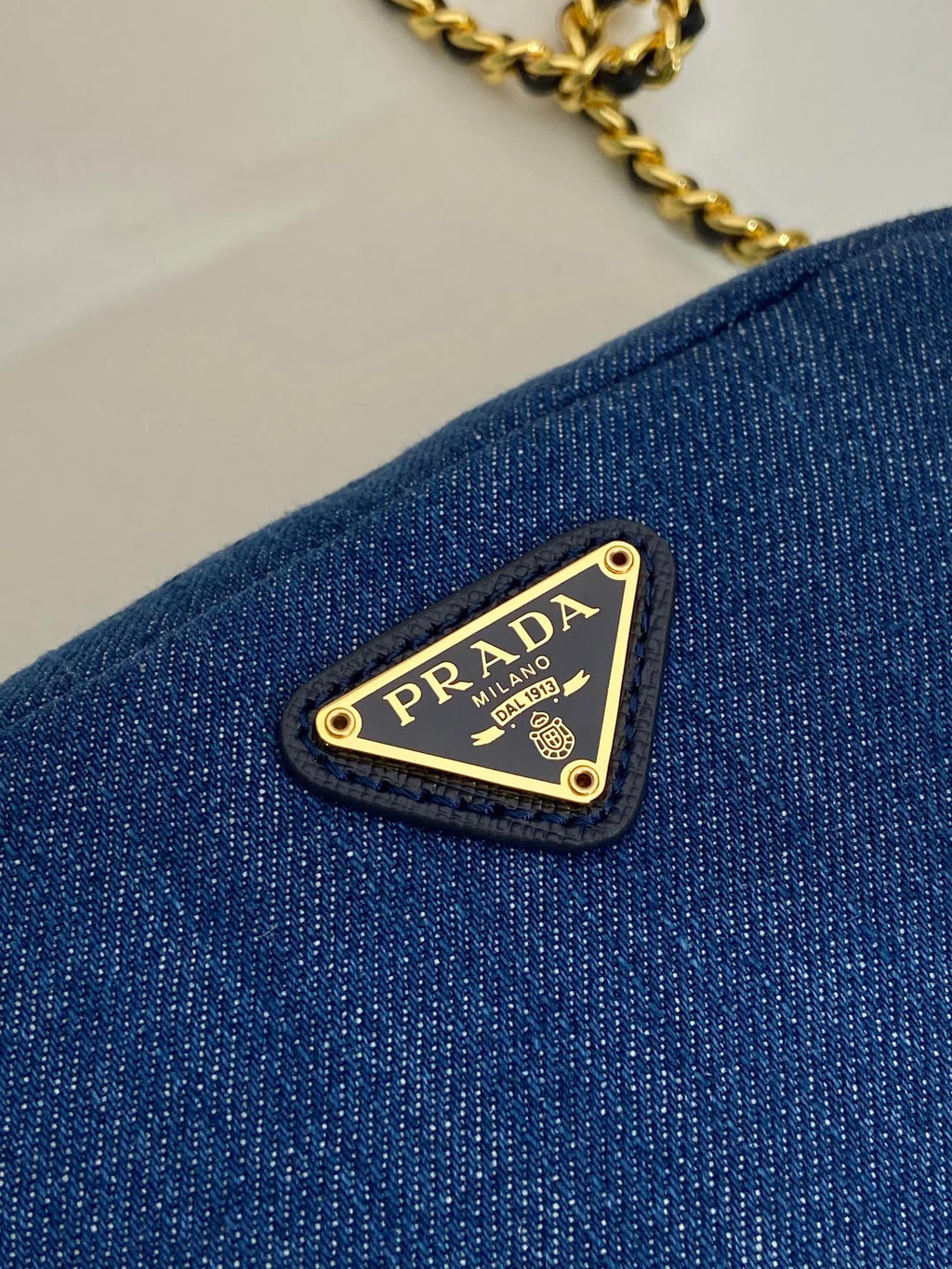 PRADA MINI BAG 14 IN AZURE BLUE DENIM GOLD HARDWARE