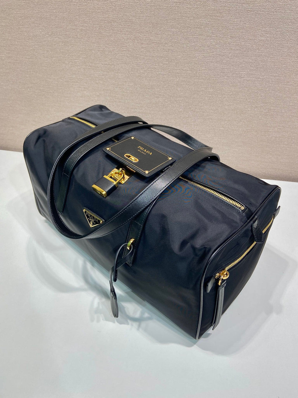PRADA TRAVEL BAG 40 IN BLACK WATERPROOF FABRIC GOLD PADLOCK