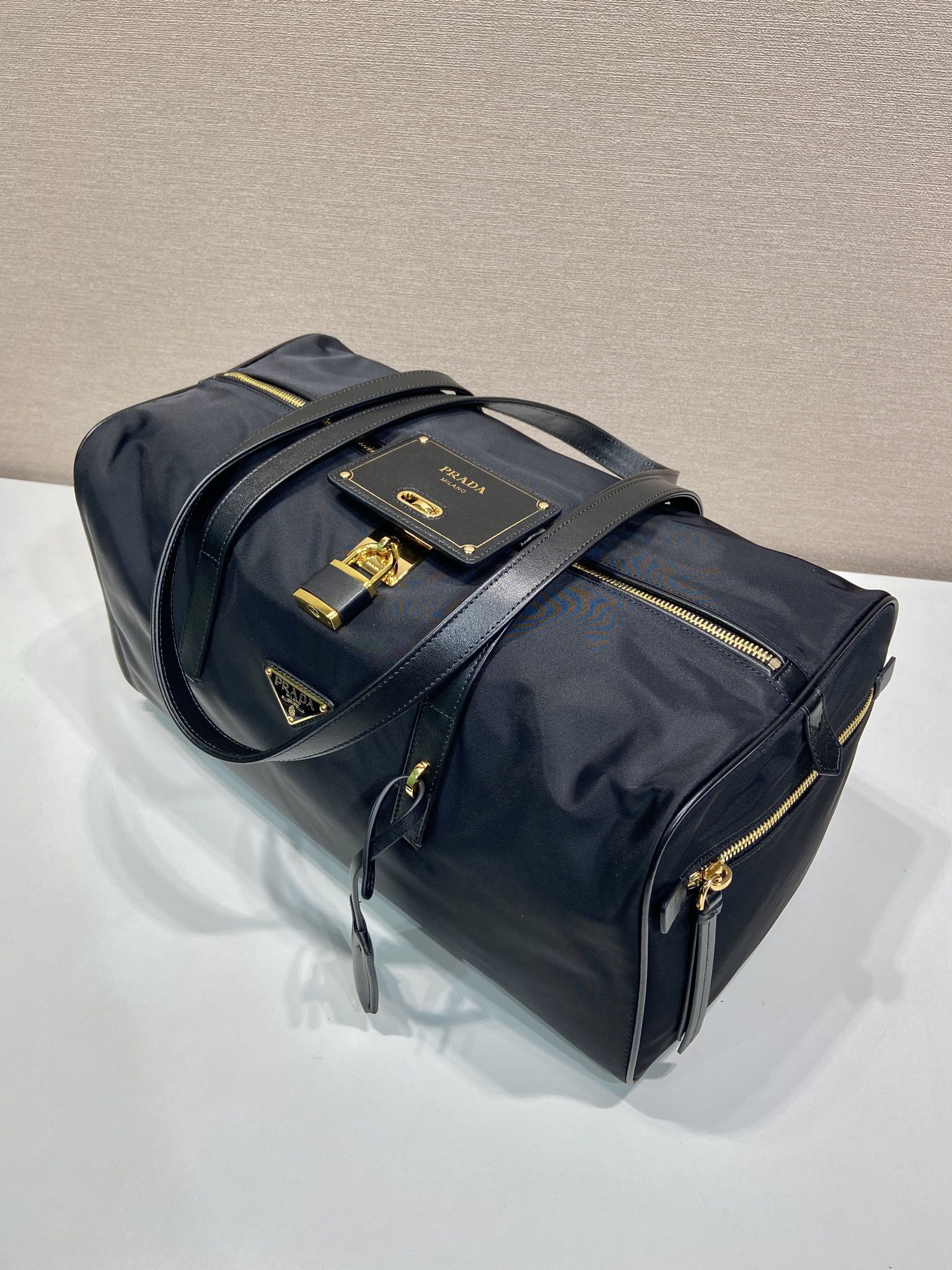 PRADA TRAVEL BAG 40 IN BLACK WATERPROOF FABRIC GOLD PADLOCK