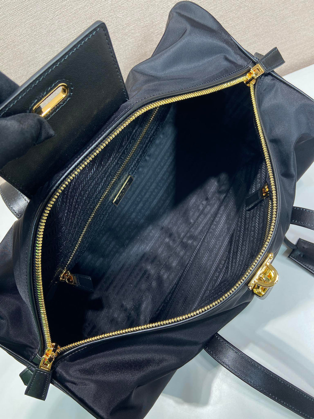 PRADA TRAVEL BAG 40 IN BLACK WATERPROOF FABRIC GOLD PADLOCK