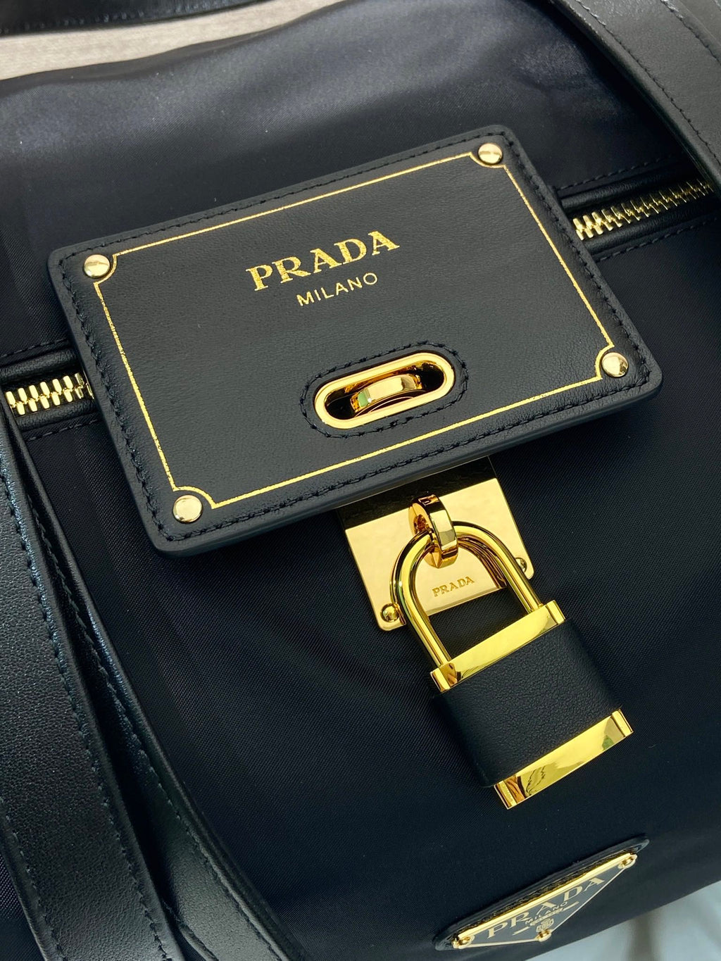 PRADA TRAVEL BAG 40 IN BLACK WATERPROOF FABRIC GOLD PADLOCK