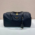 PRADA TRAVEL BAG 40 IN BLACK WATERPROOF FABRIC GOLD PADLOCK