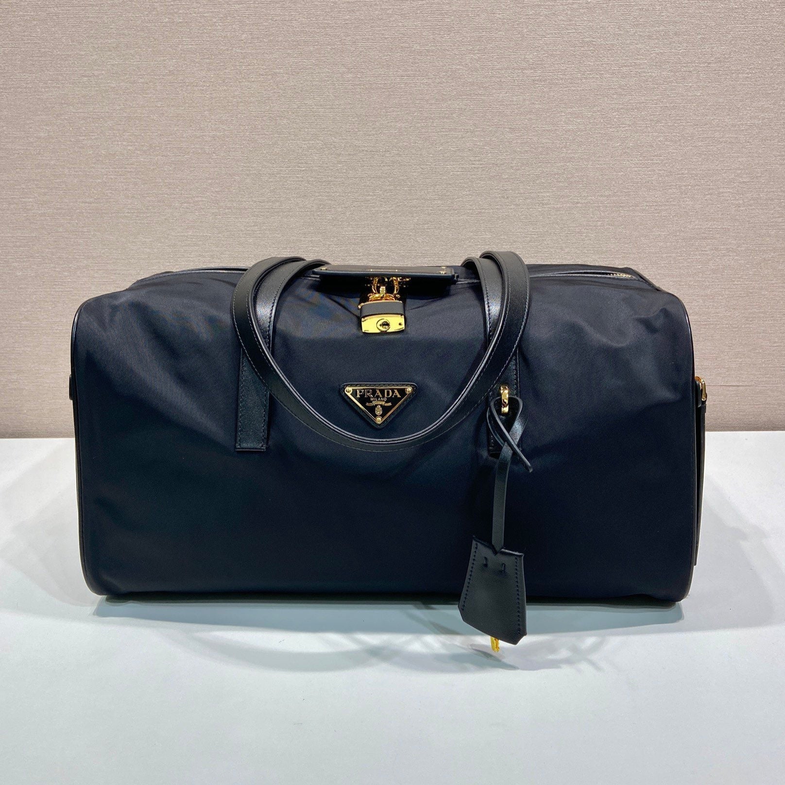 PRADA TRAVEL BAG 40 IN BLACK WATERPROOF FABRIC GOLD PADLOCK