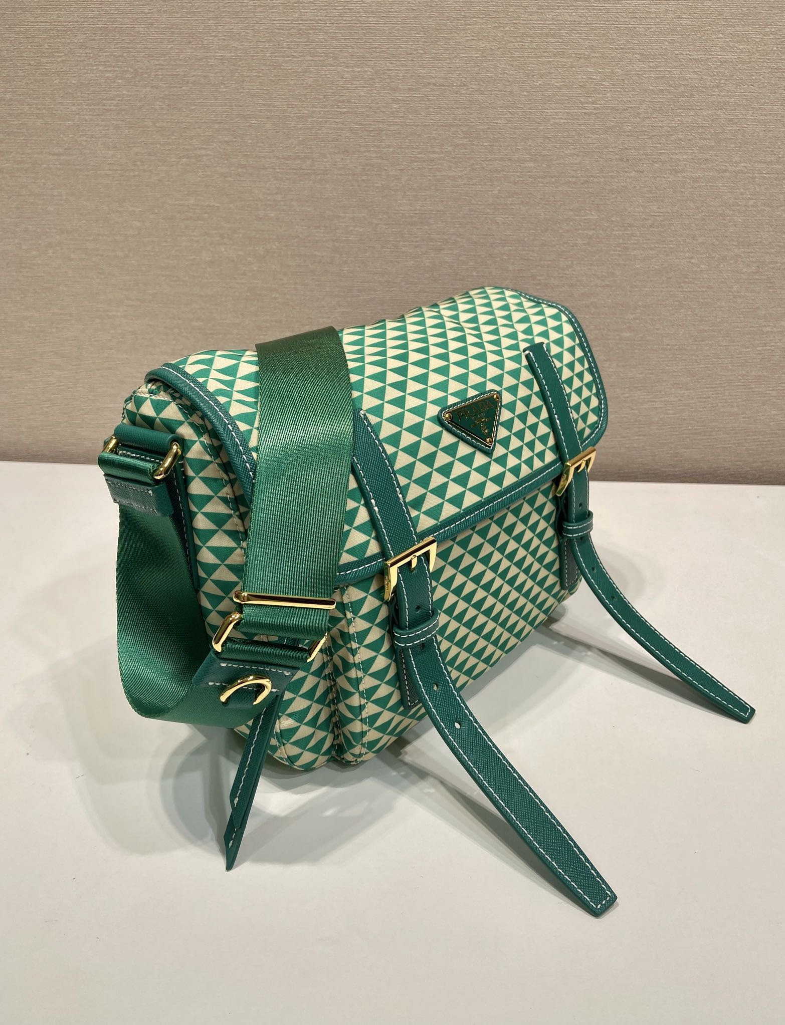 PRADA MESSENGER BAG 25 IN FOREST GREEN MIX CREAM TRIANGLE PATTERN EMBROIDERED FABRIC