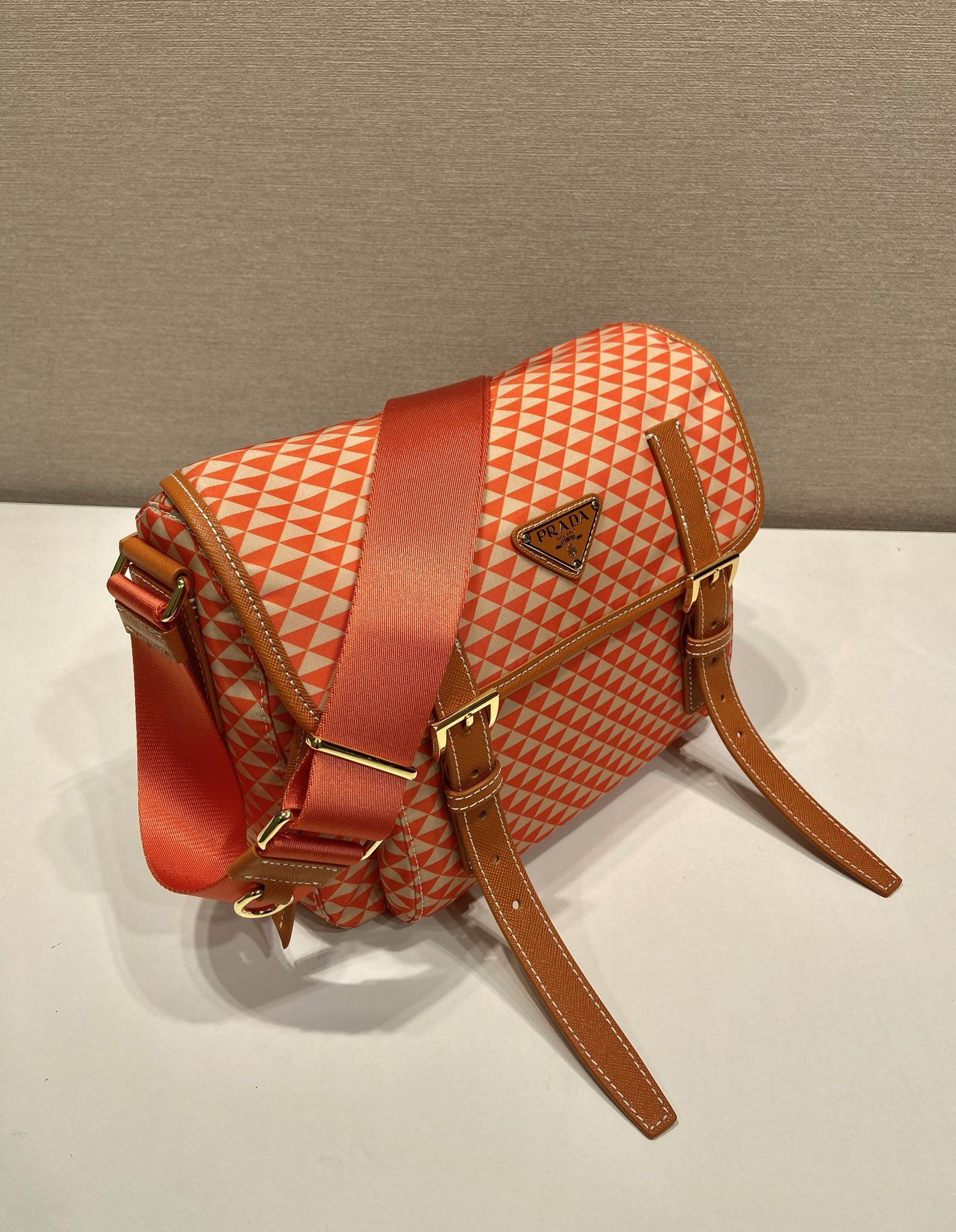 PRADA MESSENGER BAG 25 IN ORANGE MIX CREAM TRIANGLE PATTERN EMBROIDERED FABRIC