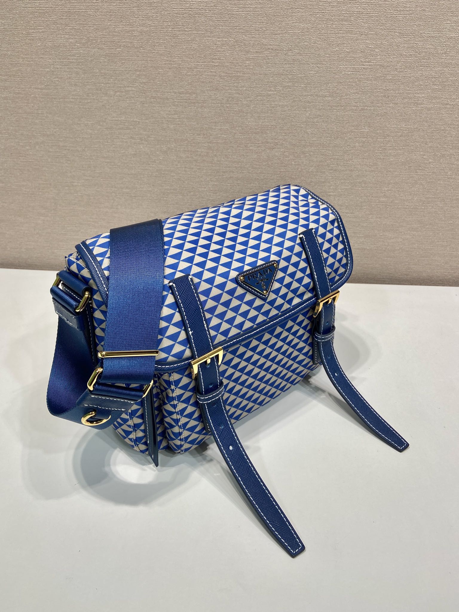 PRADA MESSENGER BAG 25 IN BLUE MIX WHITE TRIANGLE PATTERN EMBROIDERED FABRIC