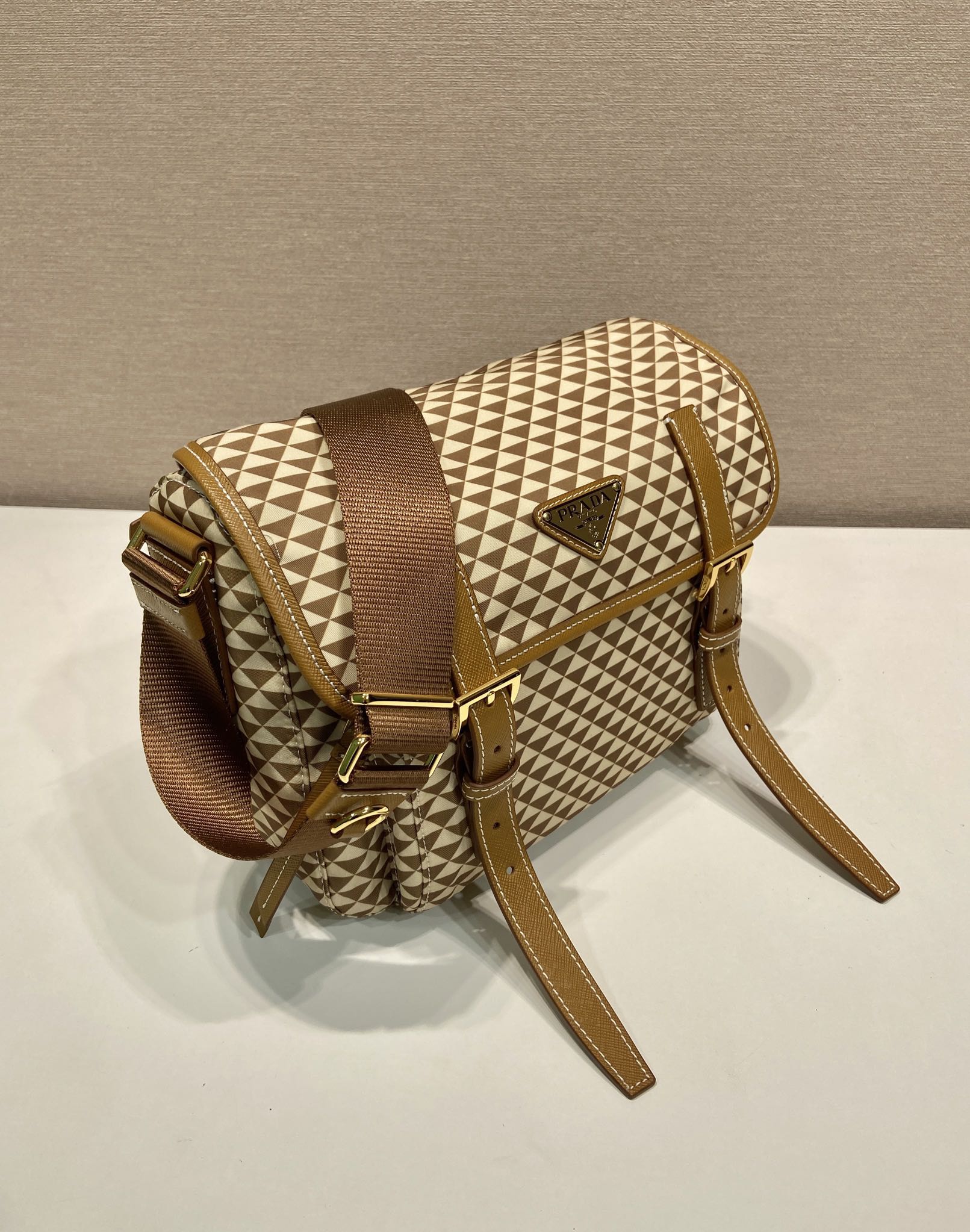 PRADA MESSENGER BAG 25 IN BROWN MIX CREAM TRIANGLE PATTERN EMBROIDERED FABRIC