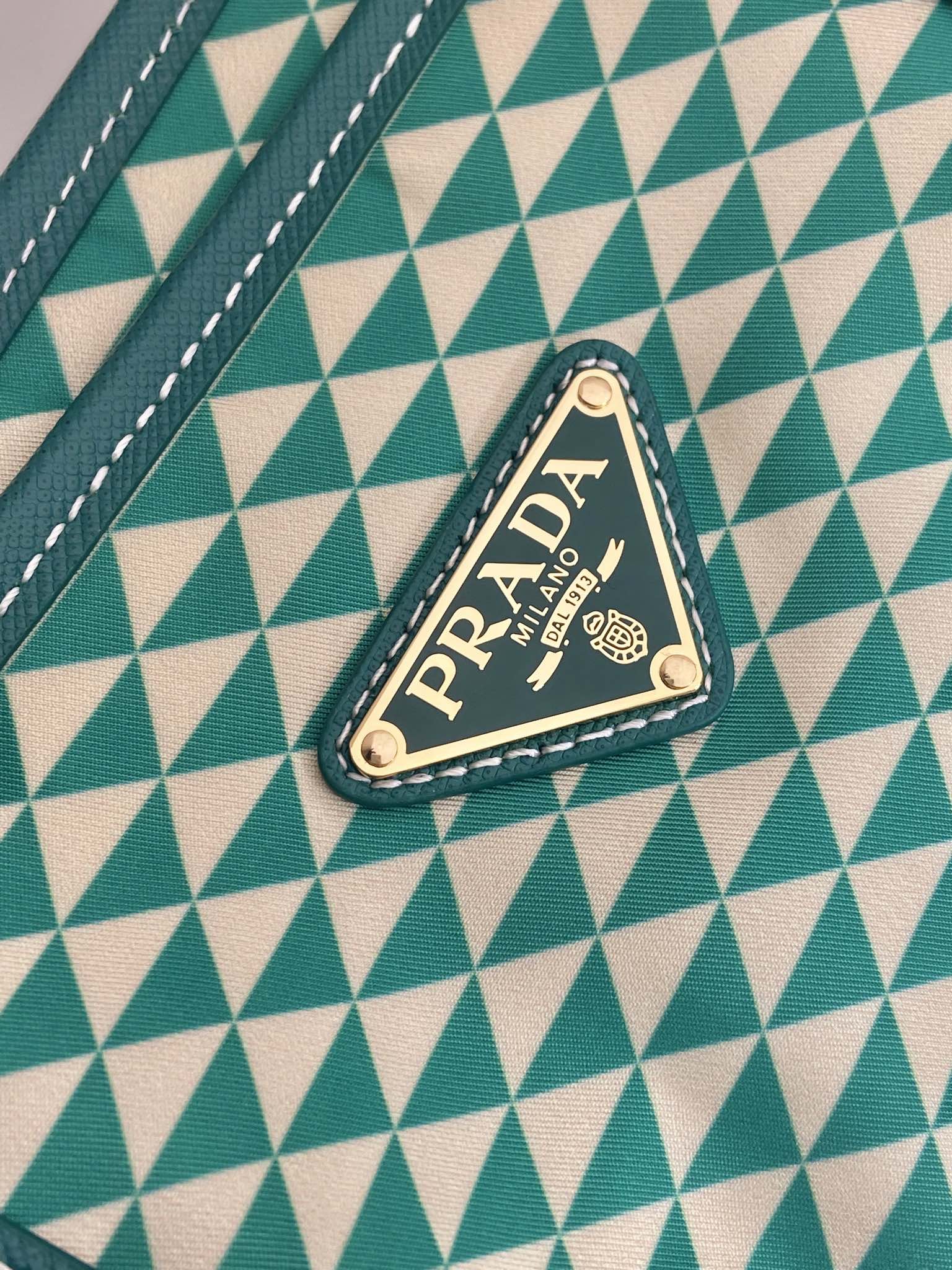 PRADA TOTE BAG 33 IN FOREST GREEN MIX CREAM TRIANGLE PATTERN EMBROIDERED FABRIC