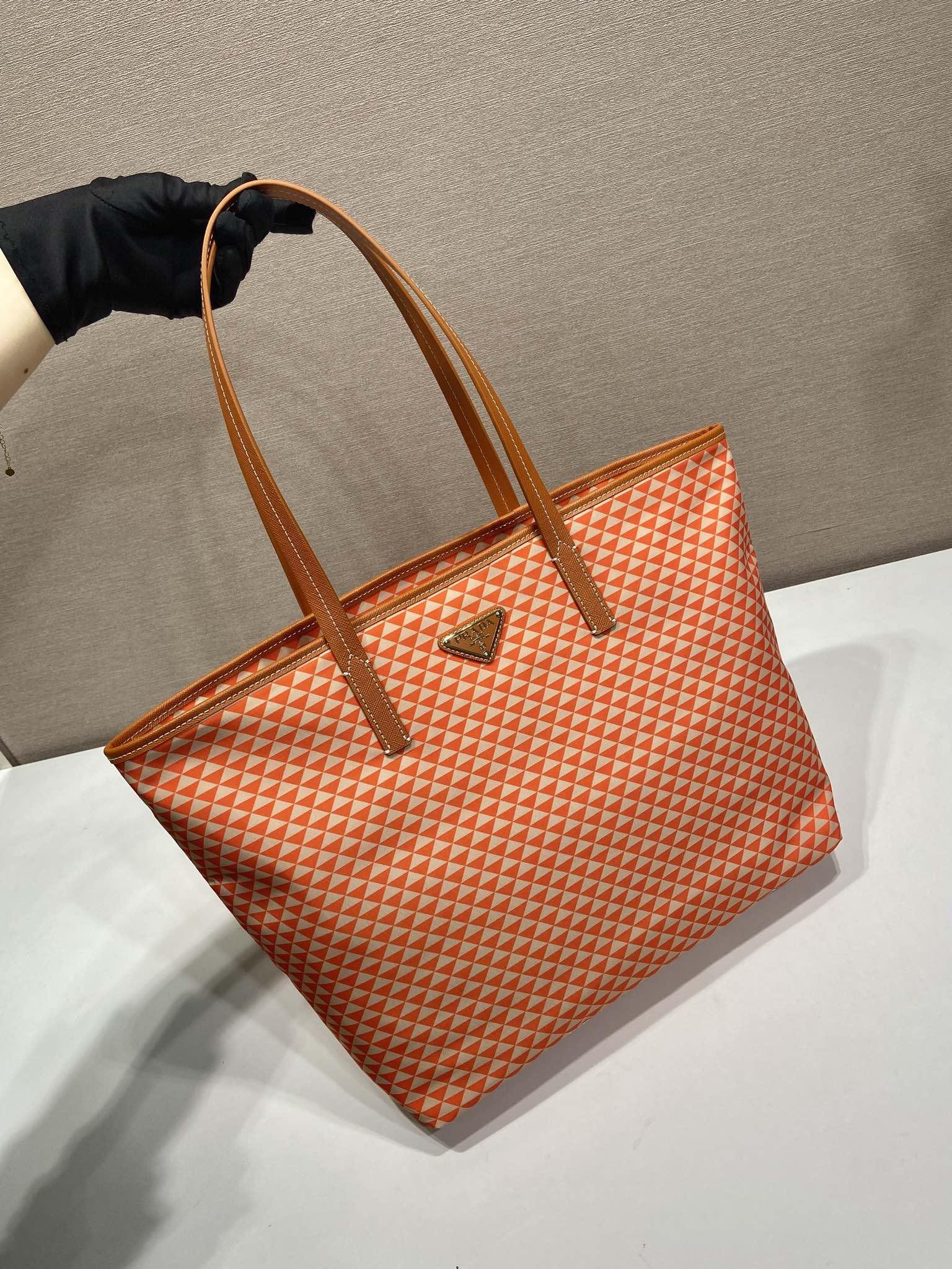 PRADA TOTE BAG 33 IN ORANGE MIX WHITE TRIANGLE PATTERN EMBROIDERED FABRIC