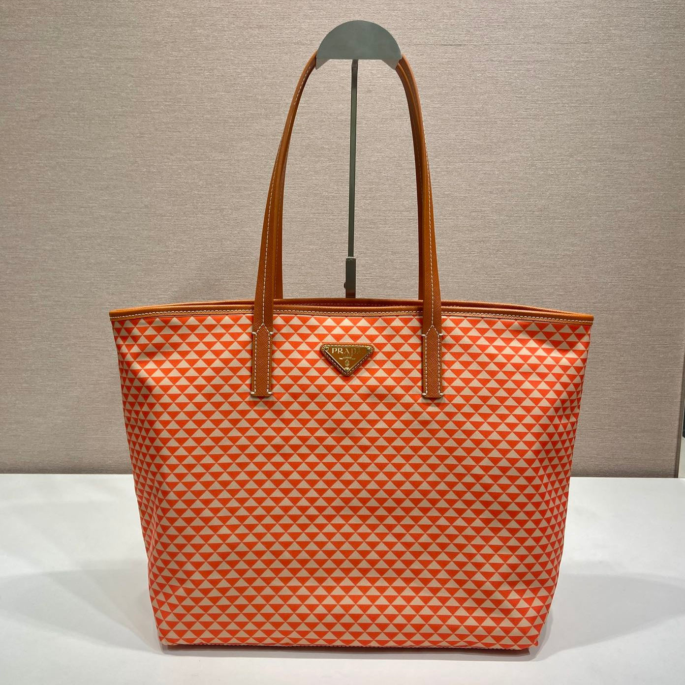 PRADA TOTE BAG 33 IN ORANGE MIX WHITE TRIANGLE PATTERN EMBROIDERED FABRIC