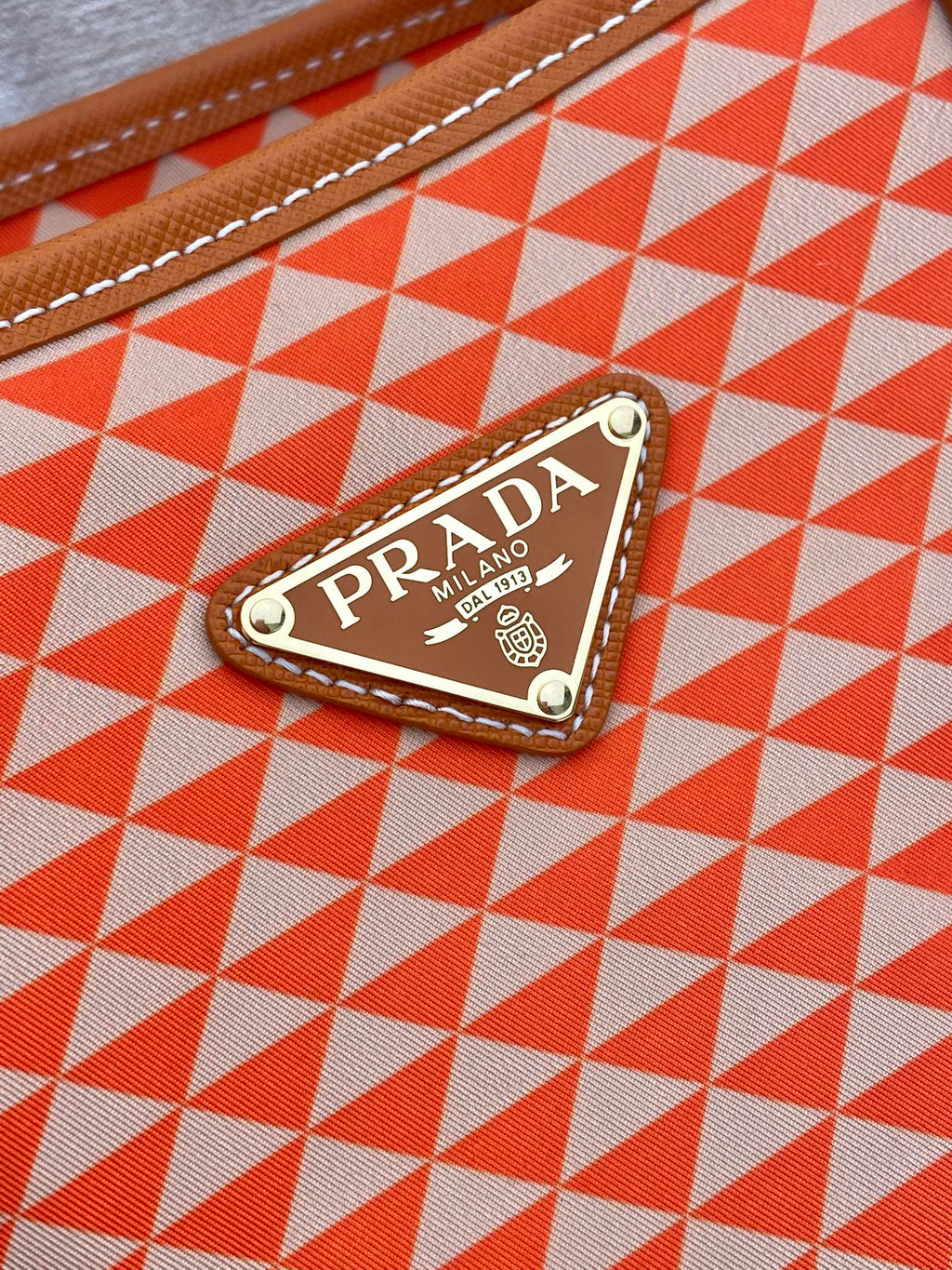 PRADA TOTE BAG 33 IN ORANGE MIX WHITE TRIANGLE PATTERN EMBROIDERED FABRIC