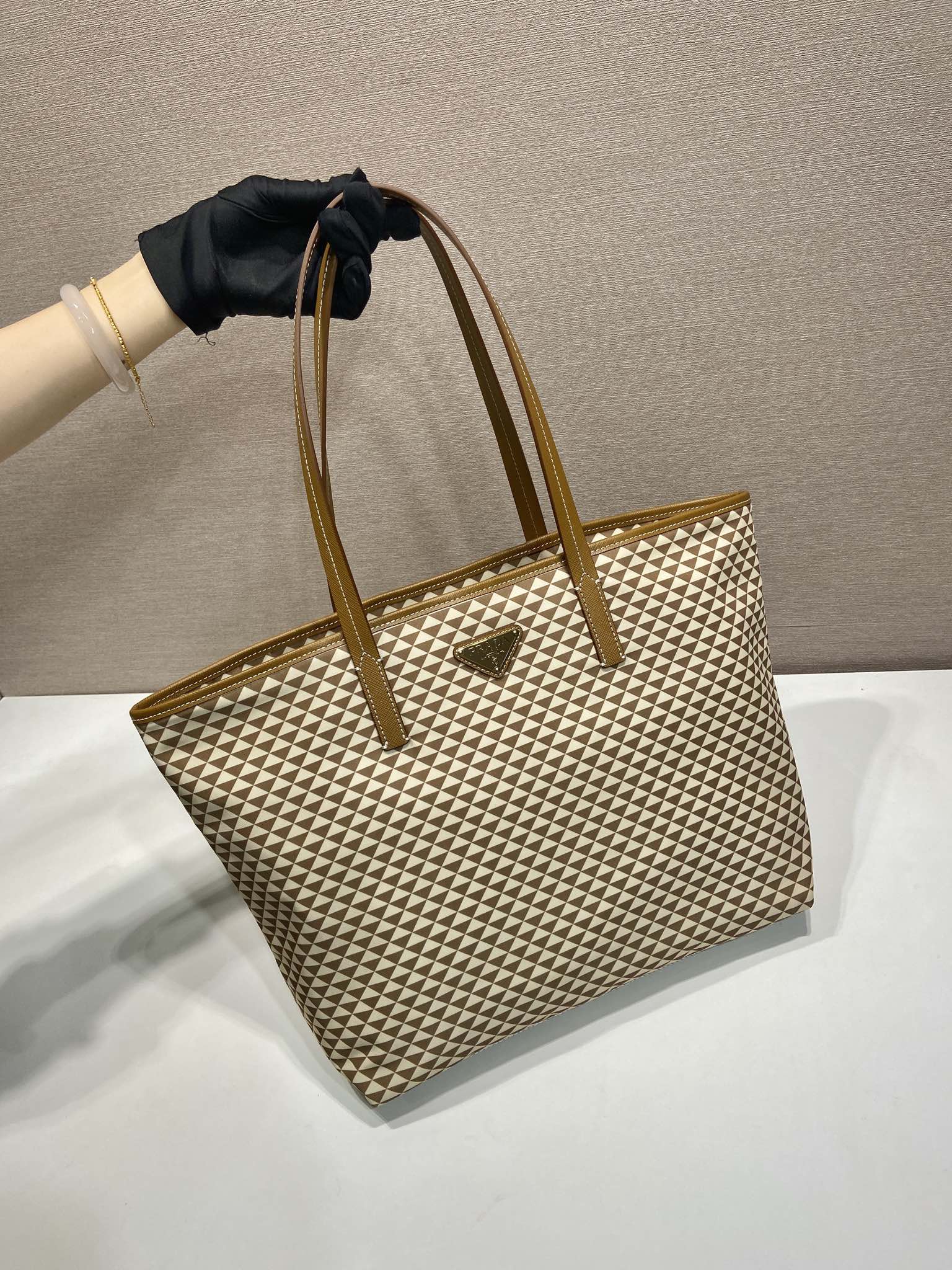 PRADA TOTE BAG 33 IN BROWN MIX CREAM TRIANGLE PATTERN EMBROIDERED FABRIC