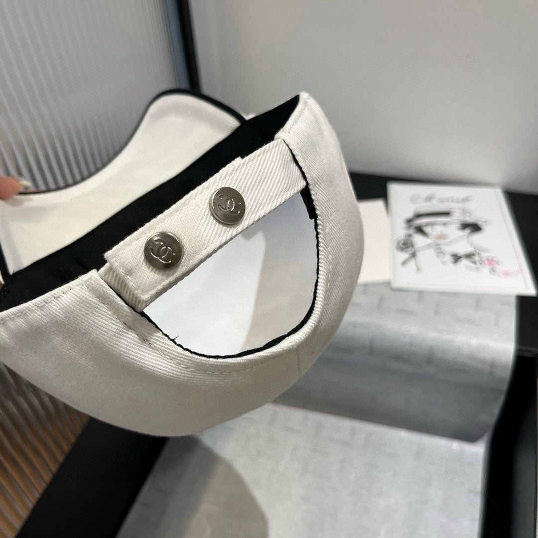 CHANEL BASEBALL HAT IN WHITE WITH BLACK TRIM 673994
