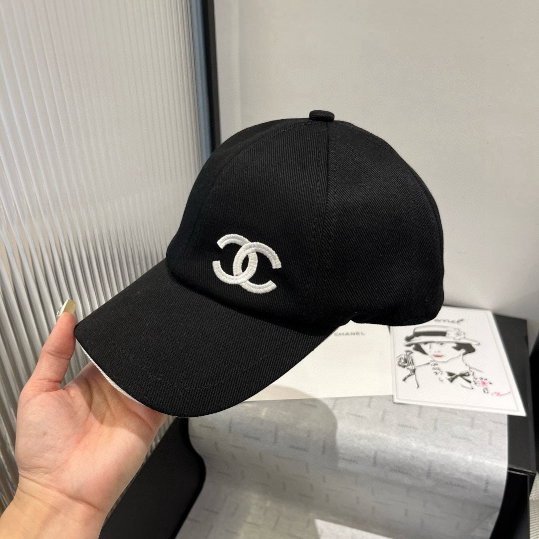 CHANEL BASEBALL HAT IN BLACK WITH WHITE TRIM 673995