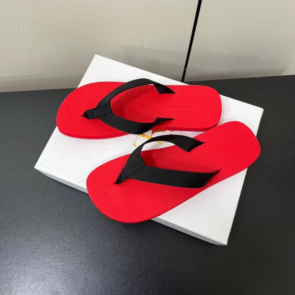 PRADA THE ROW THICK-SOLED FLIP FLOPS IN RED RUBBER