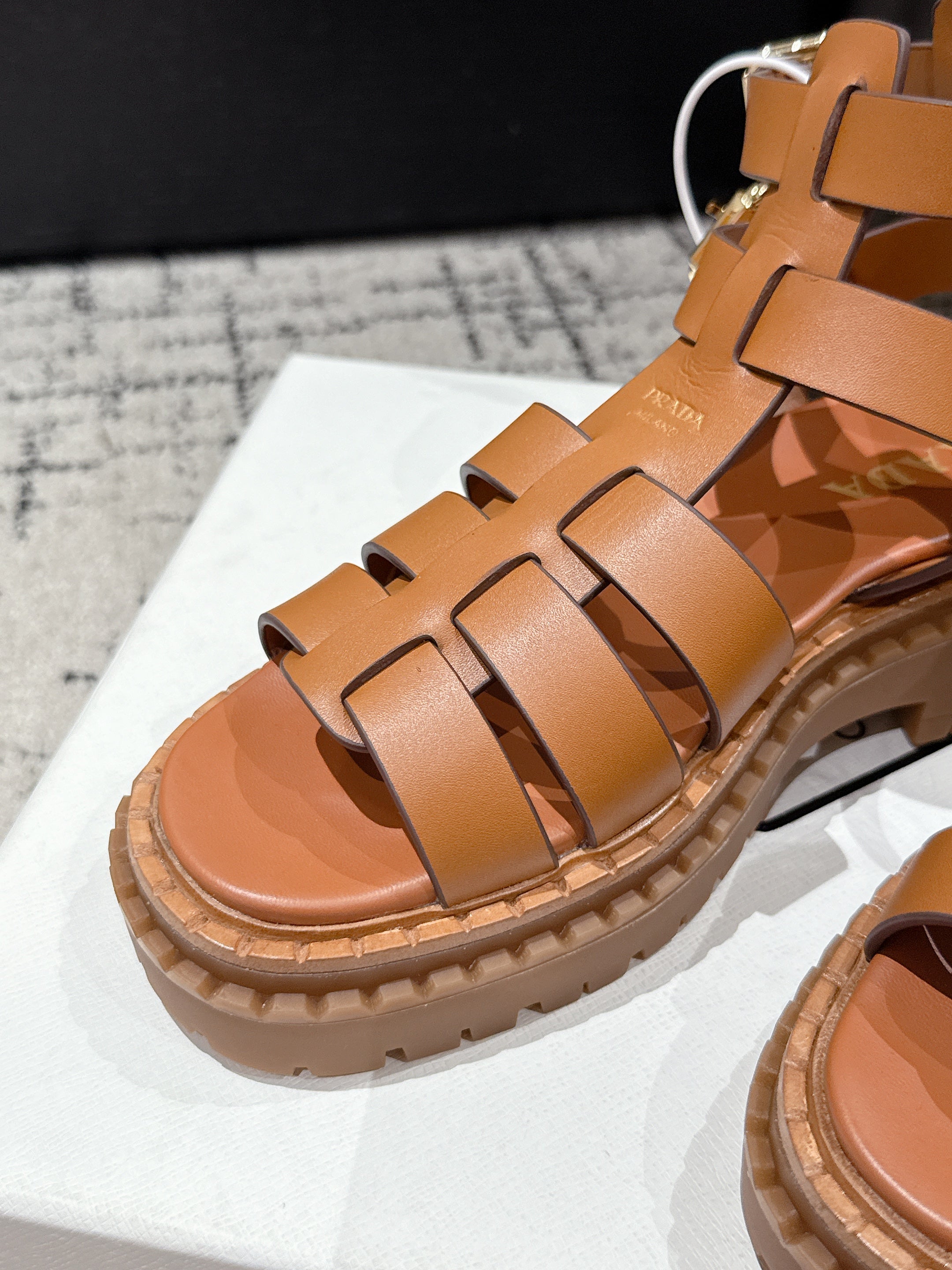 PRADA 25S HIGH TOP OPEN TOE FISHERMAN SANLS IN BURNT ORANGE CALFSKIN