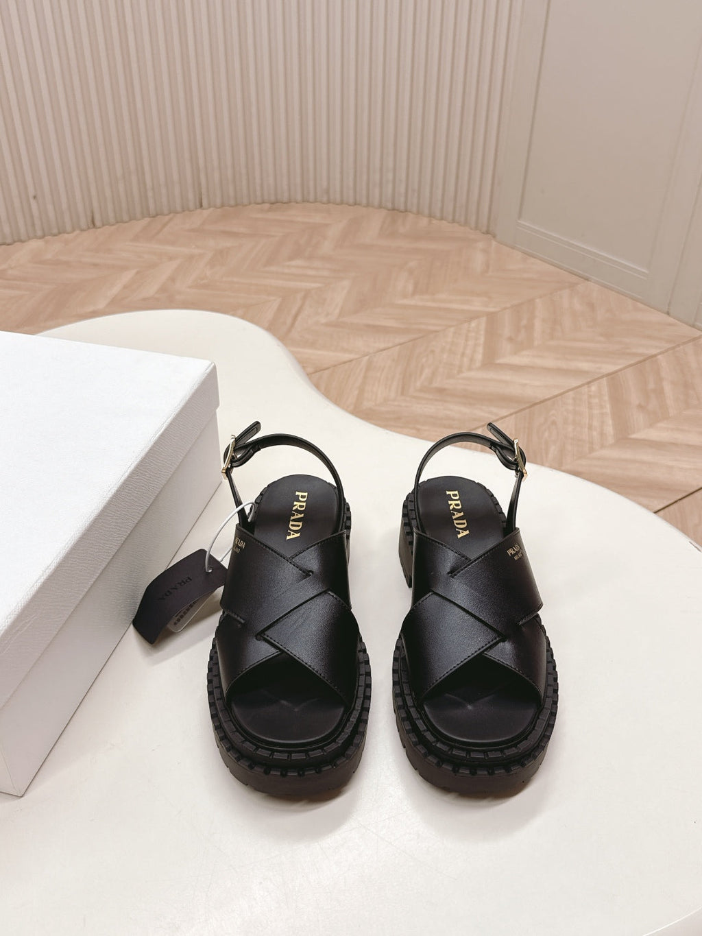 PRADA 25S CRISSCROSS SANLS IN BLACK CALFSKIN