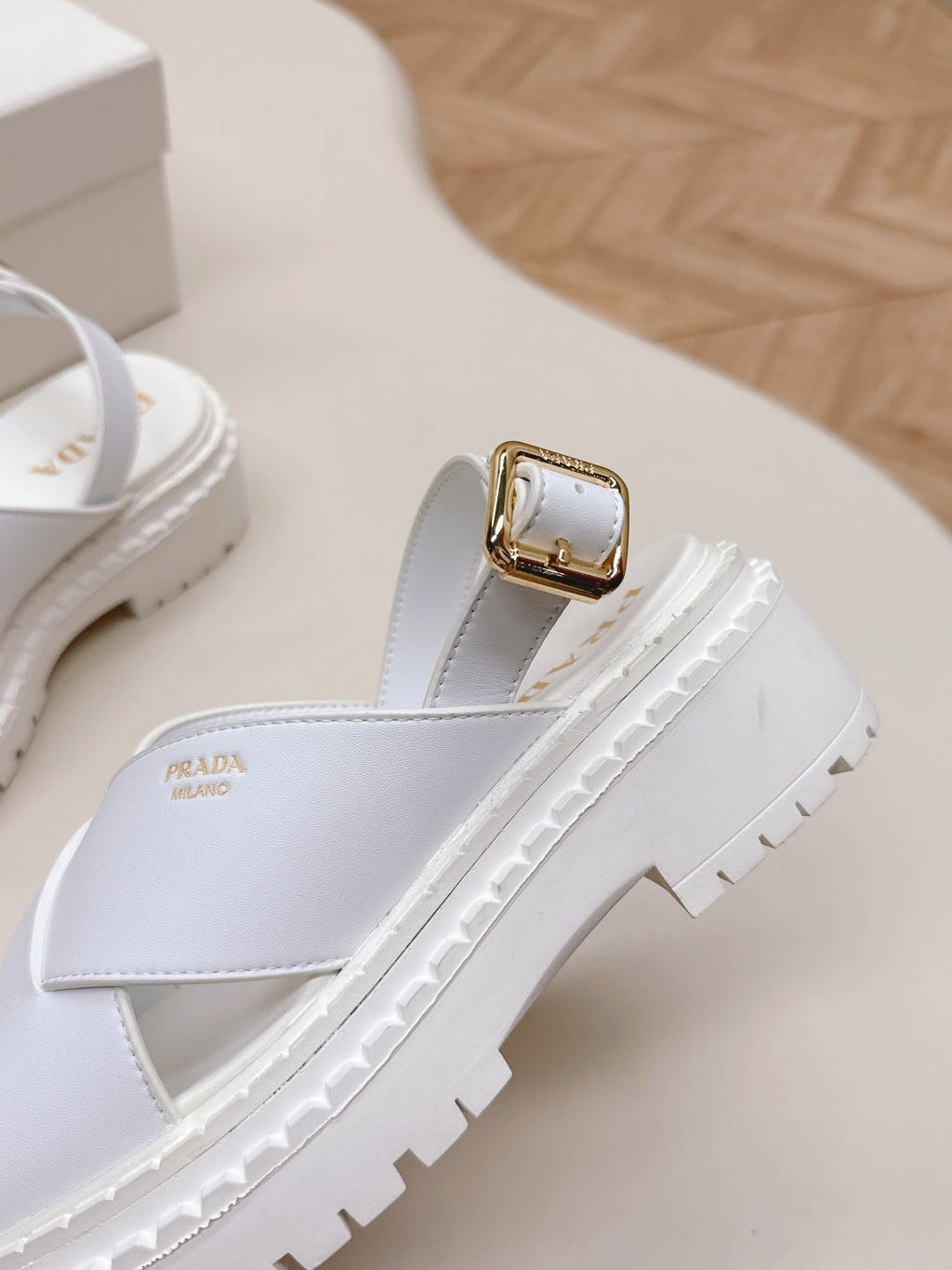 PRADA 25S CRISSCROSS SANLS IN WHITE CALFSKIN