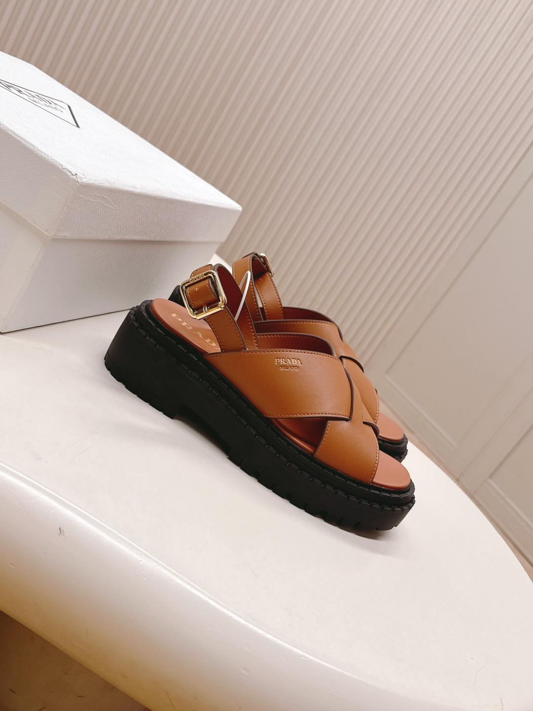 PRADA 25S CRISSCROSS SANLS IN LIGHT TAN CALFSKIN