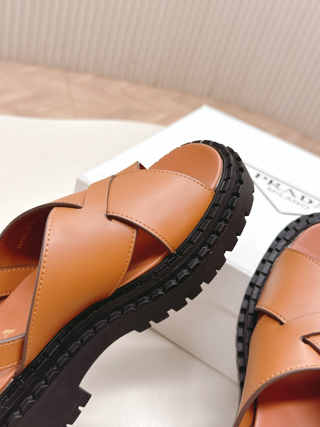 PRADA 25S CRISSCROSS SANLS IN LIGHT TAN CALFSKIN
