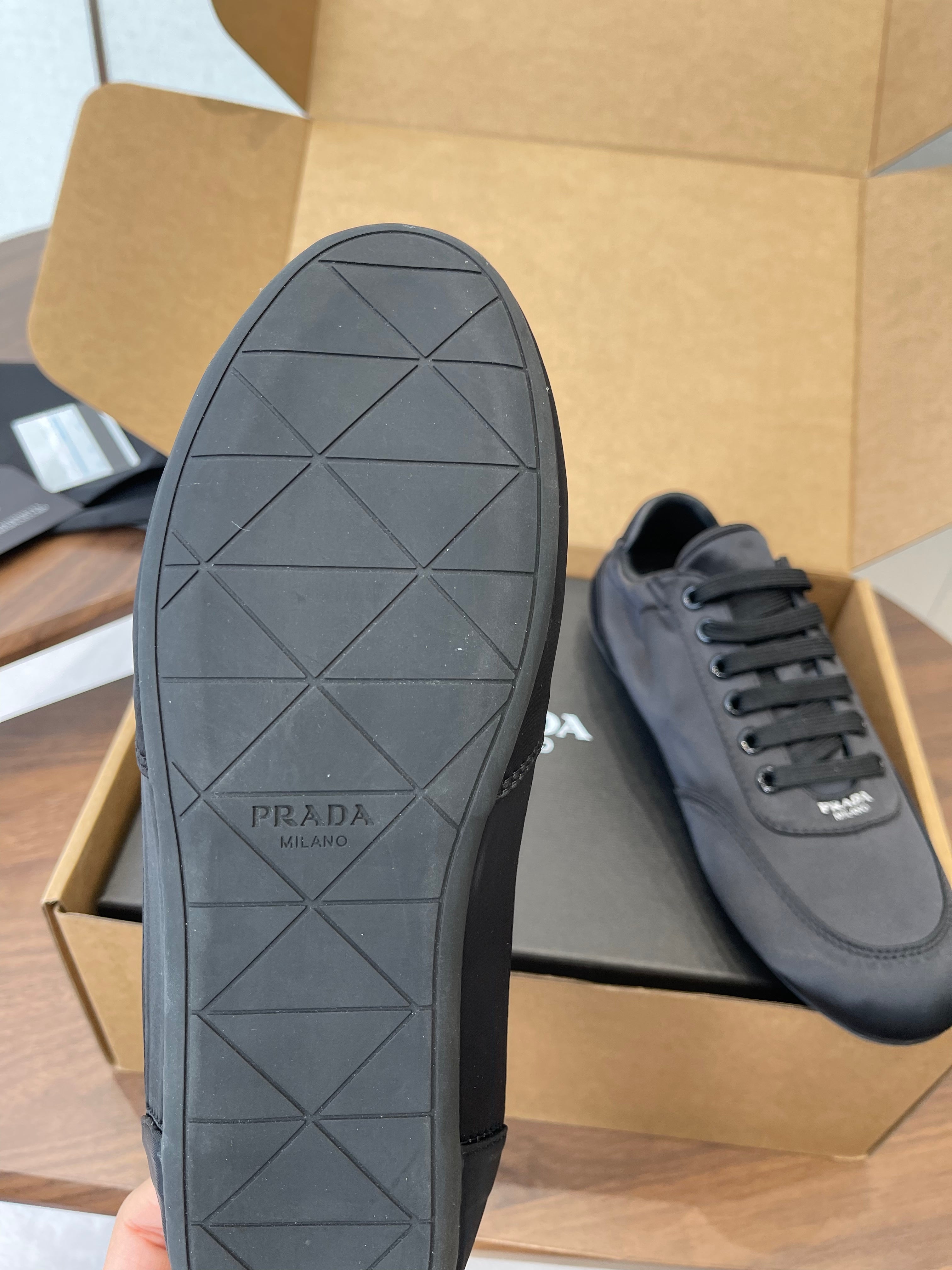 PRADA 25S SNEAKER IN BLACK SILK