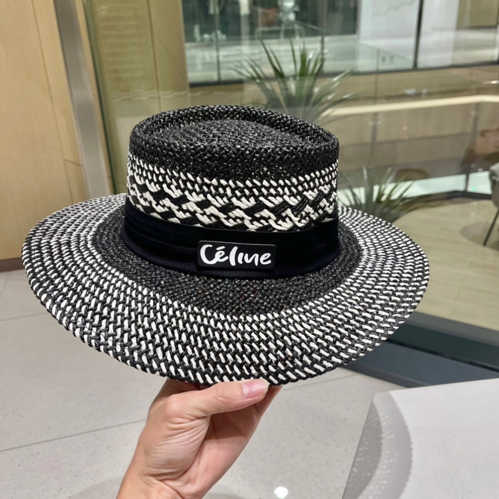 CELINE WIDE BRIM HAT MODEL 652048 IN BLACK AND WHITE WOVEN STRAW