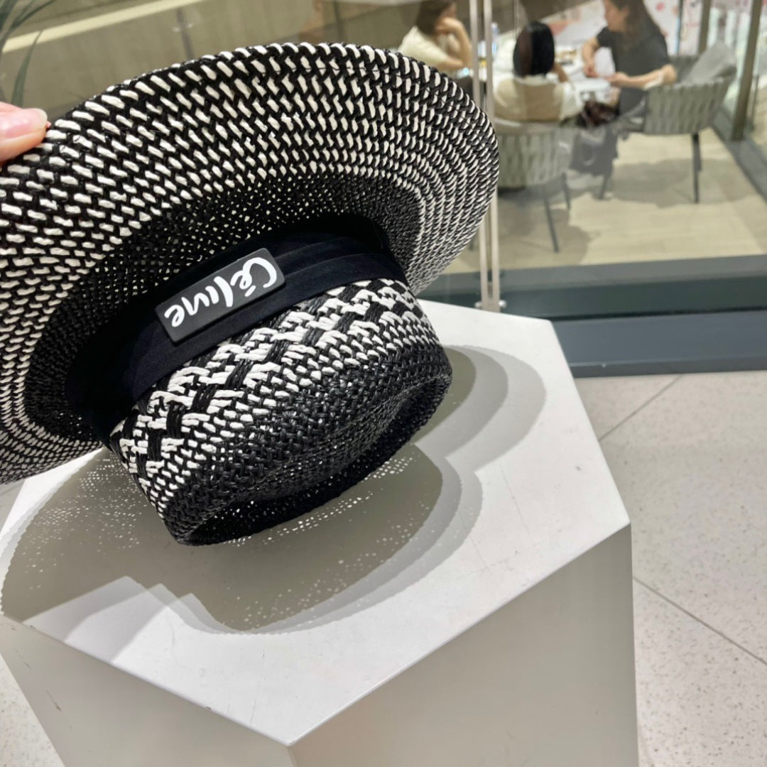 CELINE WIDE BRIM HAT MODEL 652048 IN BLACK AND WHITE WOVEN STRAW