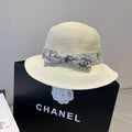 CHANEL STRAW BUCKET HAT IN IVORY WITH RIBBON BOW 673977