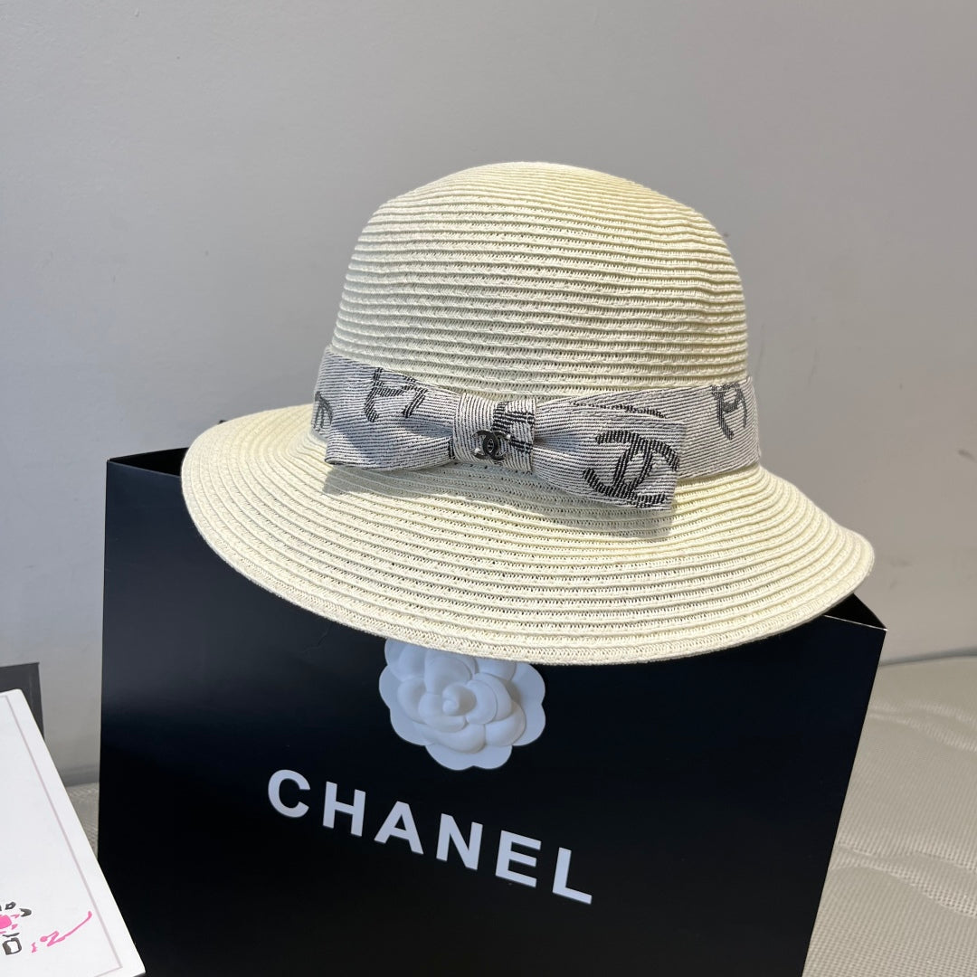 CHANEL STRAW BUCKET HAT IN IVORY WITH RIBBON BOW 673977