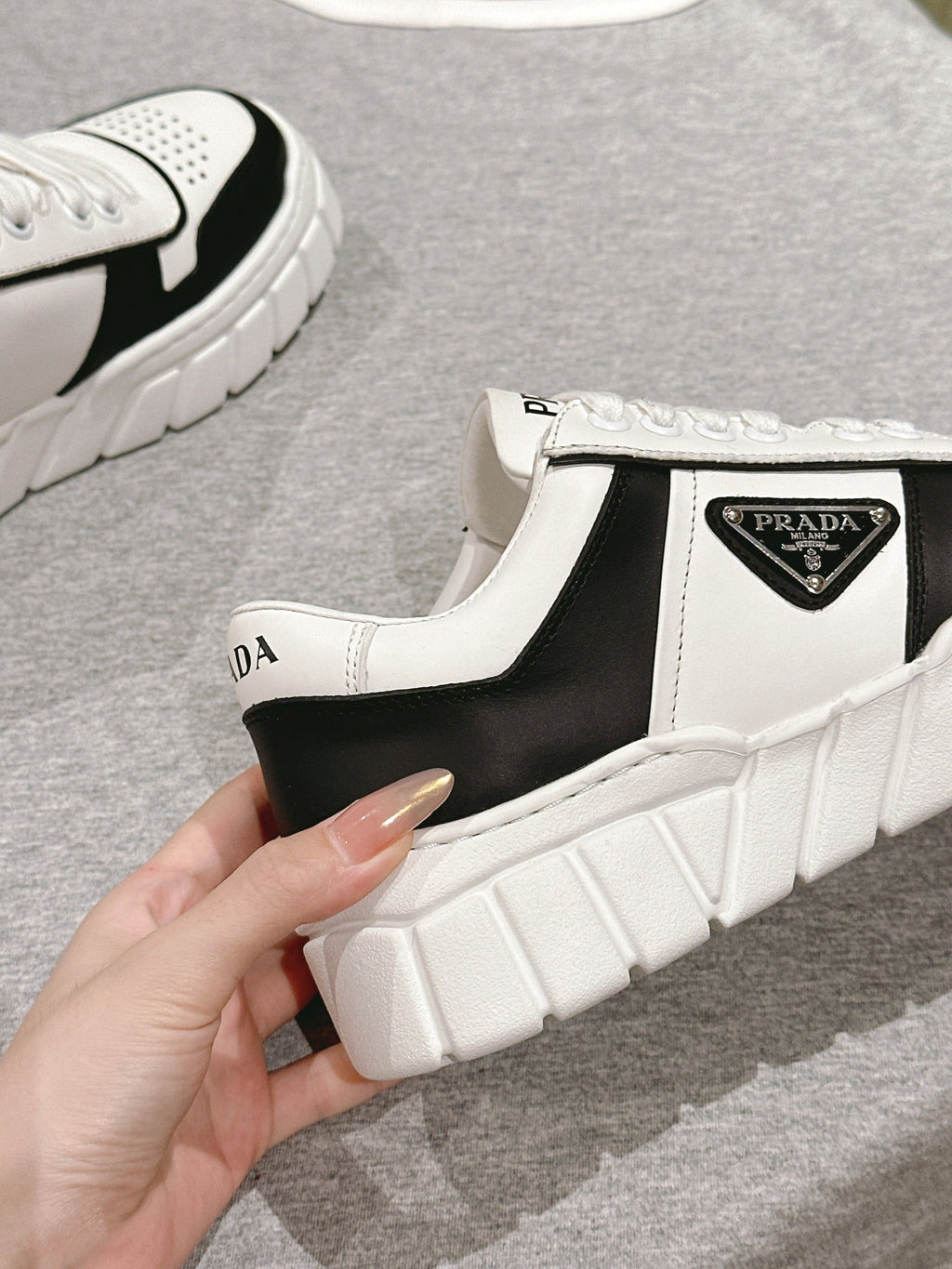 PRADA FLATFORM SNEAKERS BLACK AND WHITE CALFSKIN